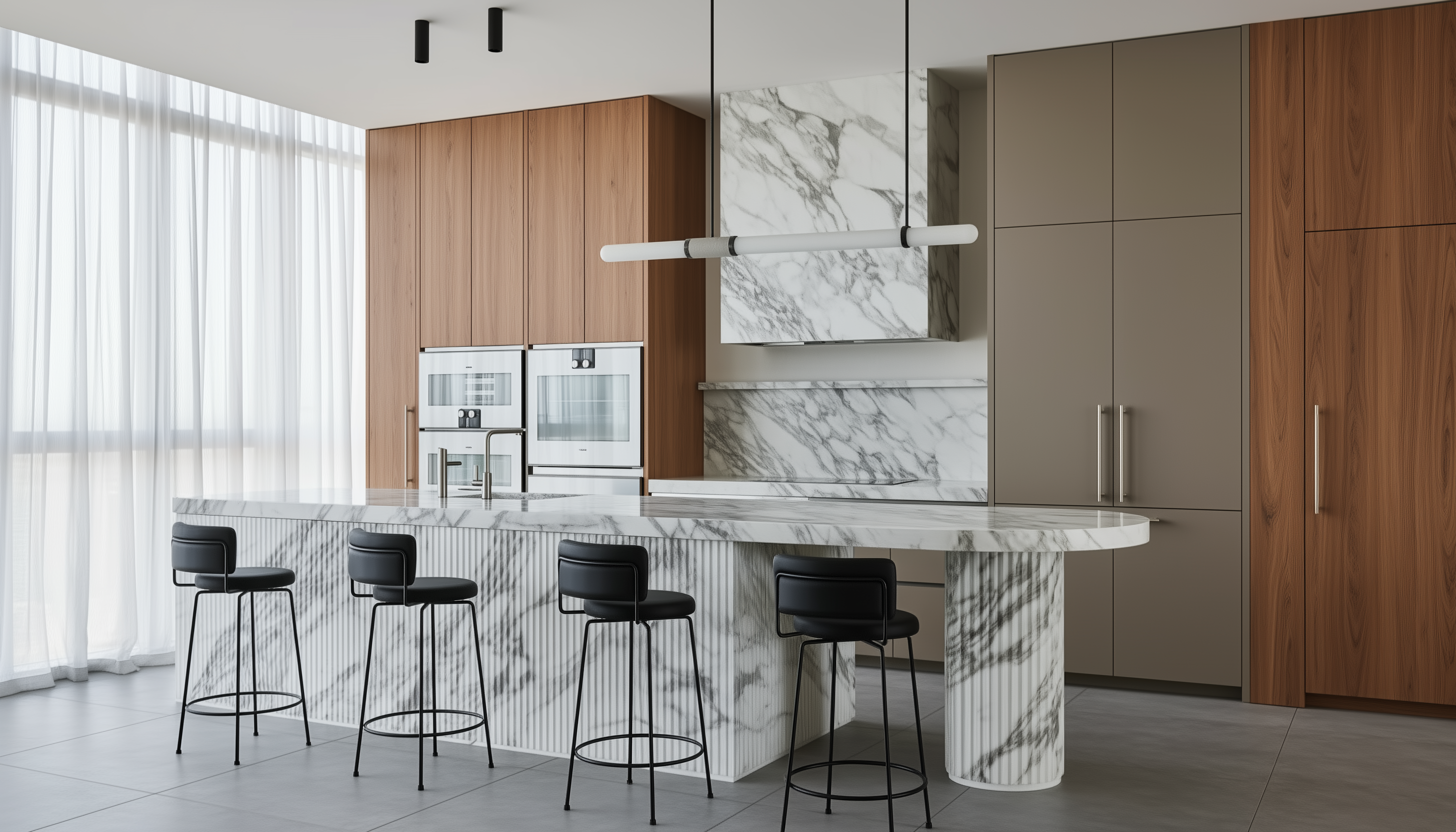 Arabescato marble kitchen island with fluted design and seating overhang