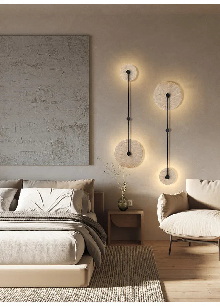 Marble wall light crafted from natural stone with soft ambient lighting