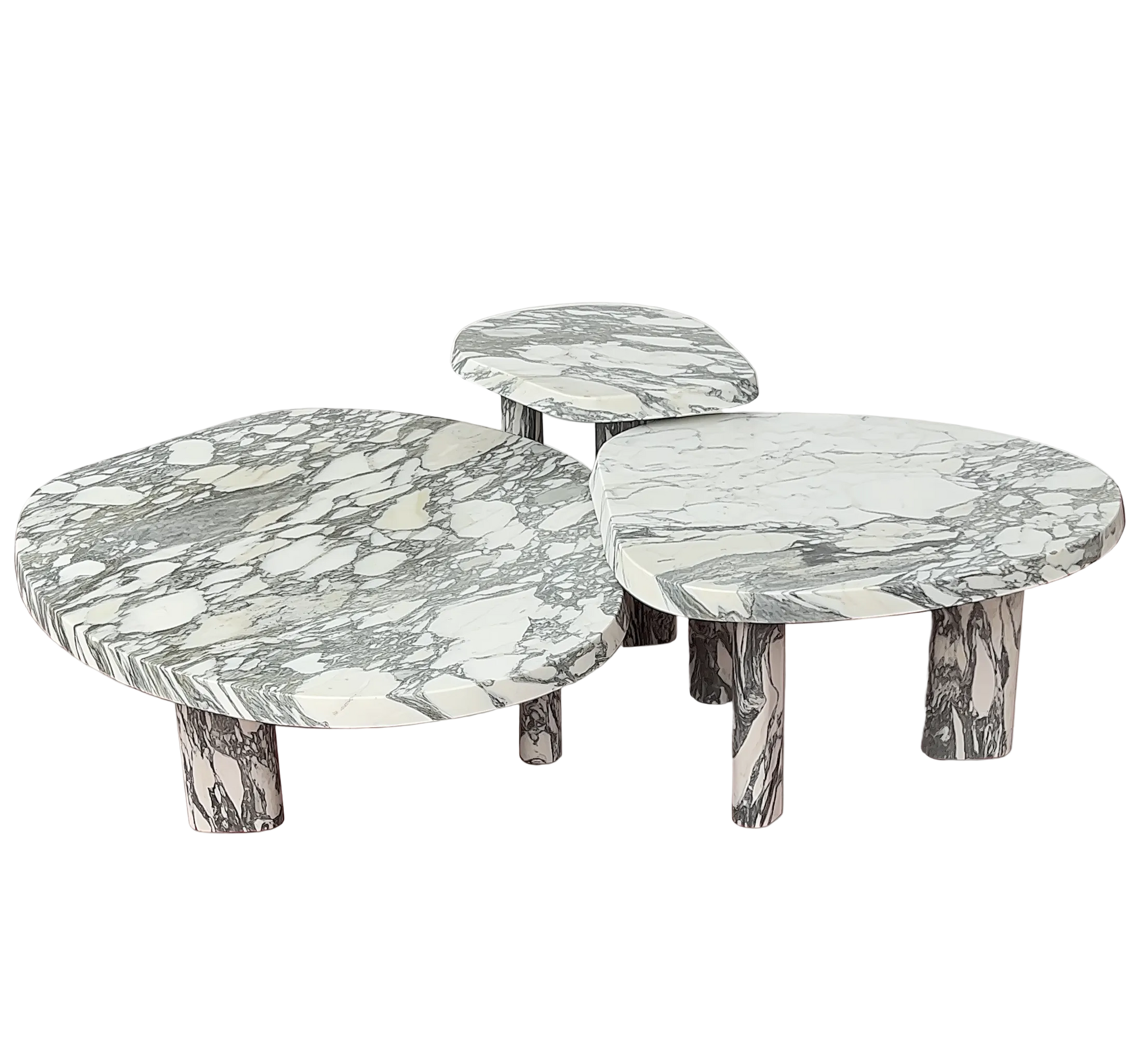 Set of three marble coffee tables with a gray and white pattern on a beige background