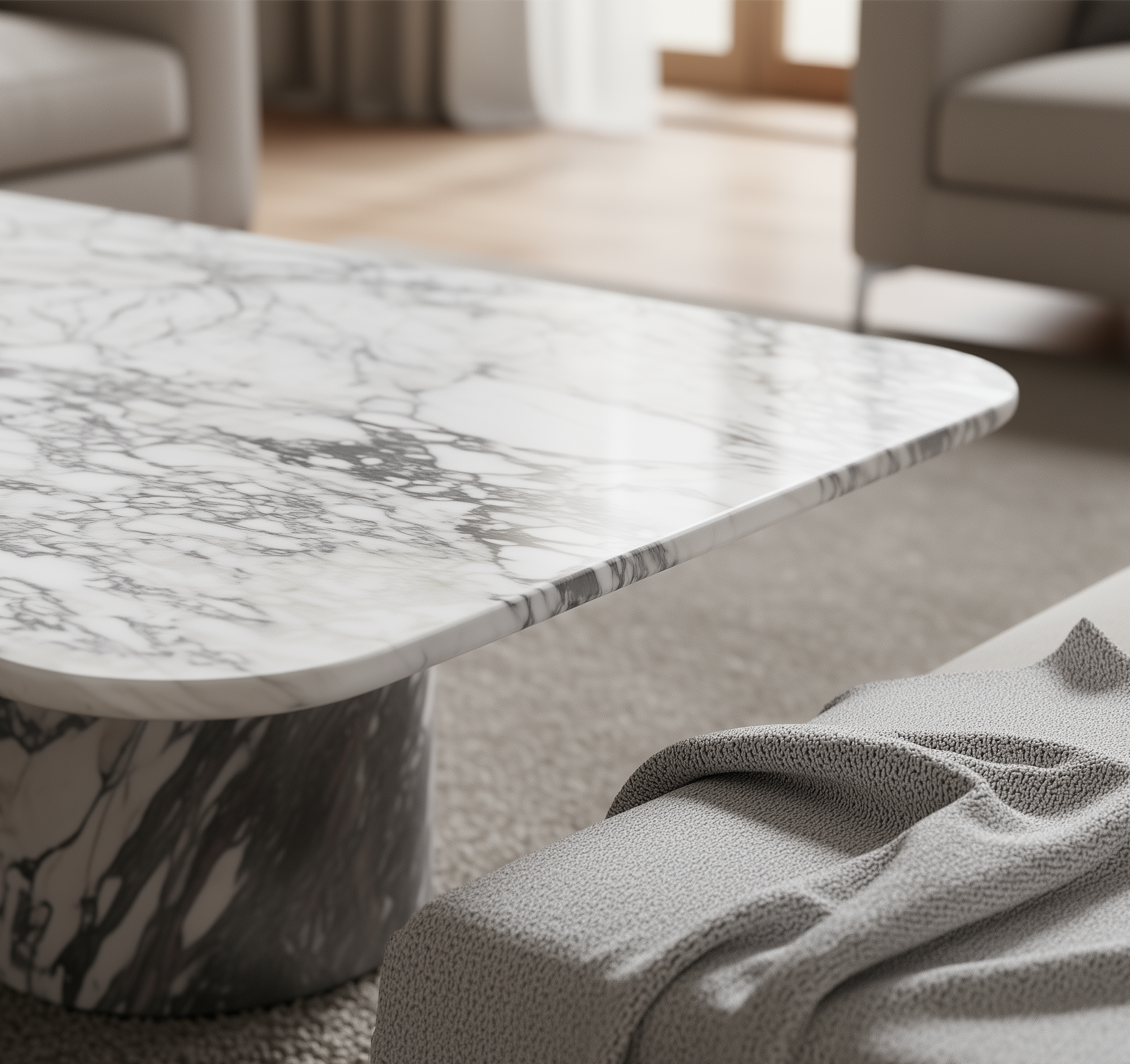 Arabescato rectangular marble coffee table in a living room setting with a sofa and rug.