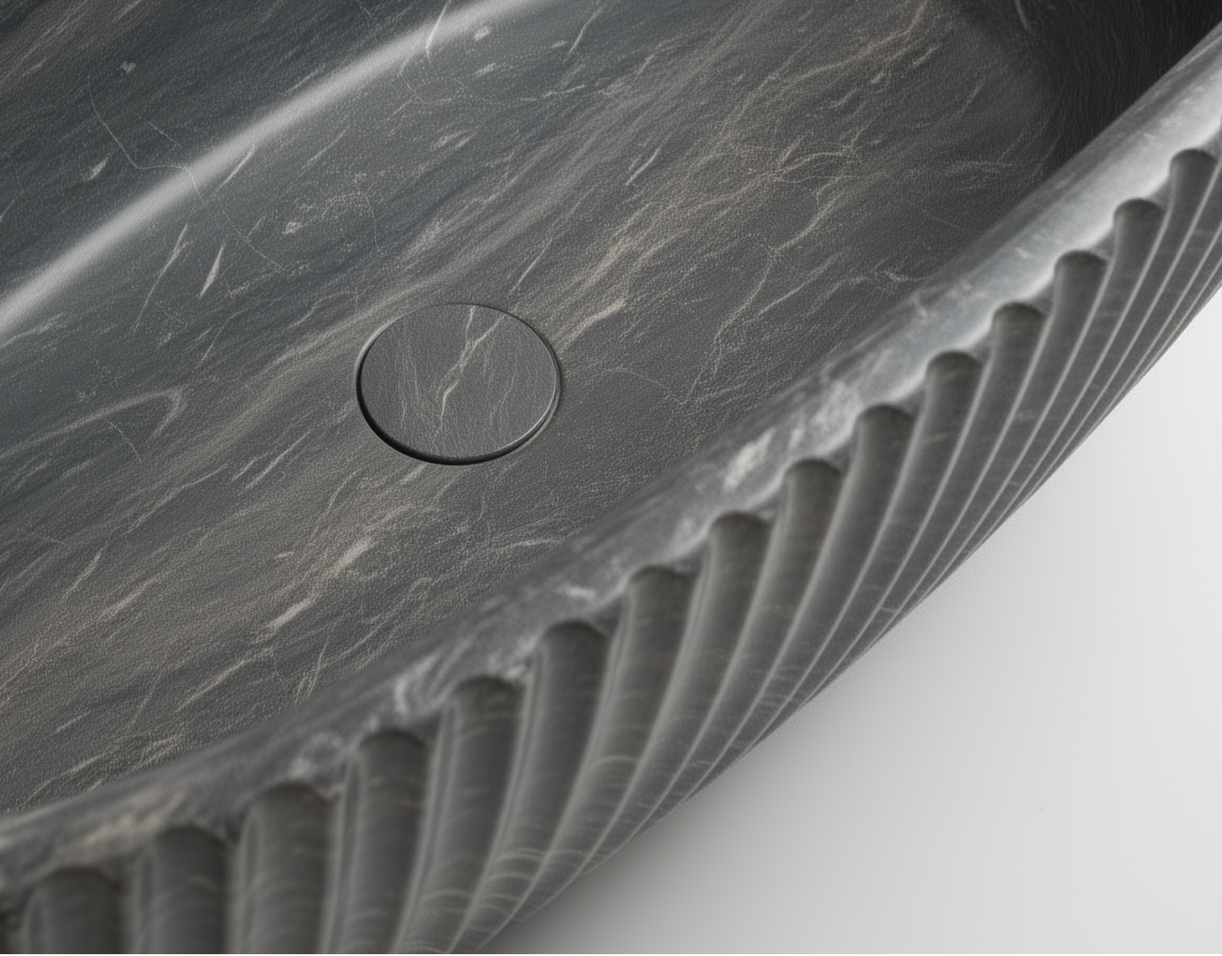 Marble-textured oval sink on a white background