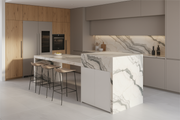 Rosa Portugallo marble kitchen island with warm beige tones and sculptural form