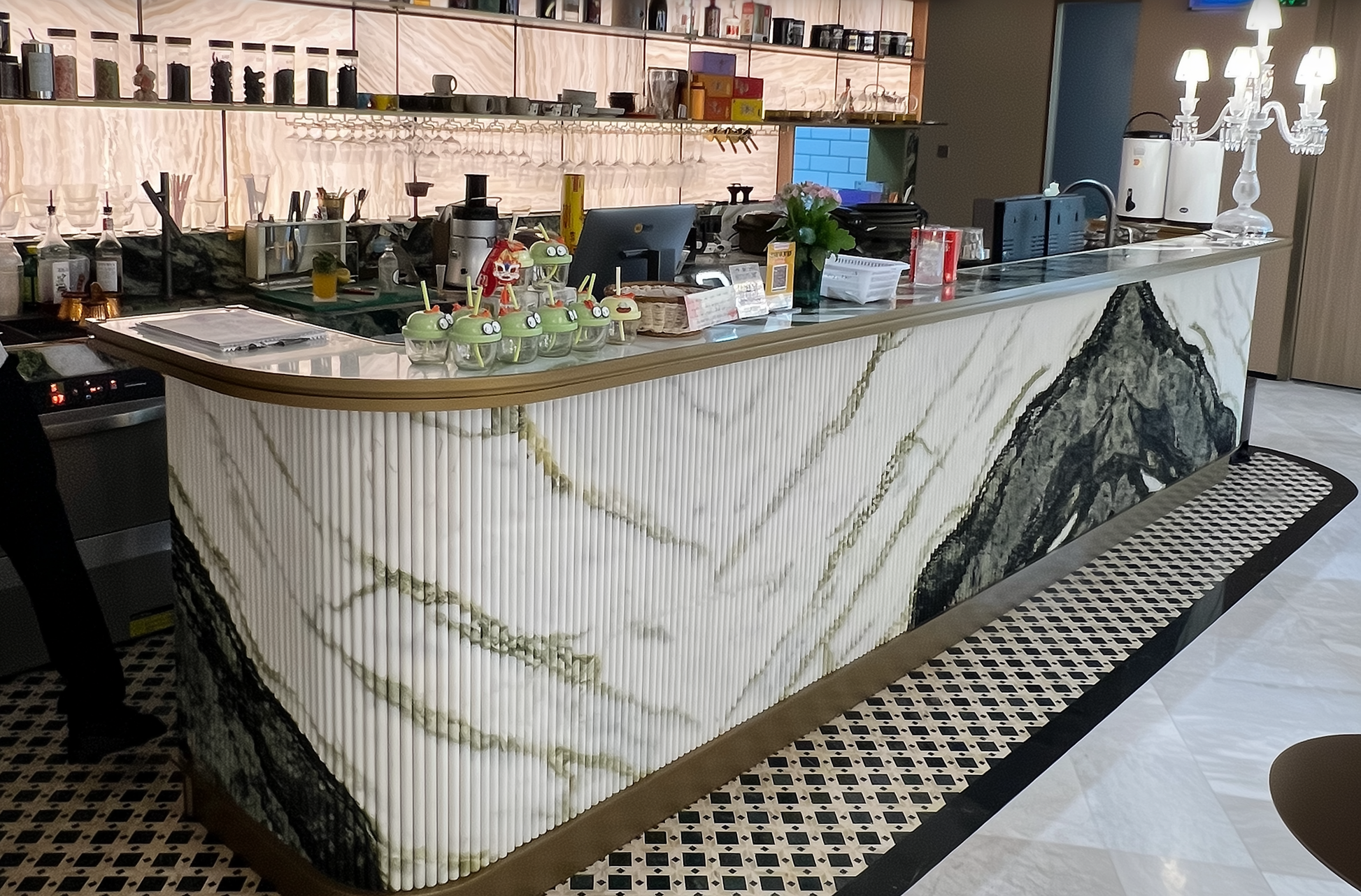 Ice Green marble kitchen island in a restaurant.