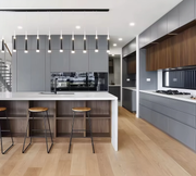 Graphite Grey & Walnut Modern Kitchen — Minimalist Luxury with Quartz Worktops
