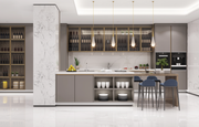 Modern kitchen with gray cabinets, white countertops, and pendant lights.