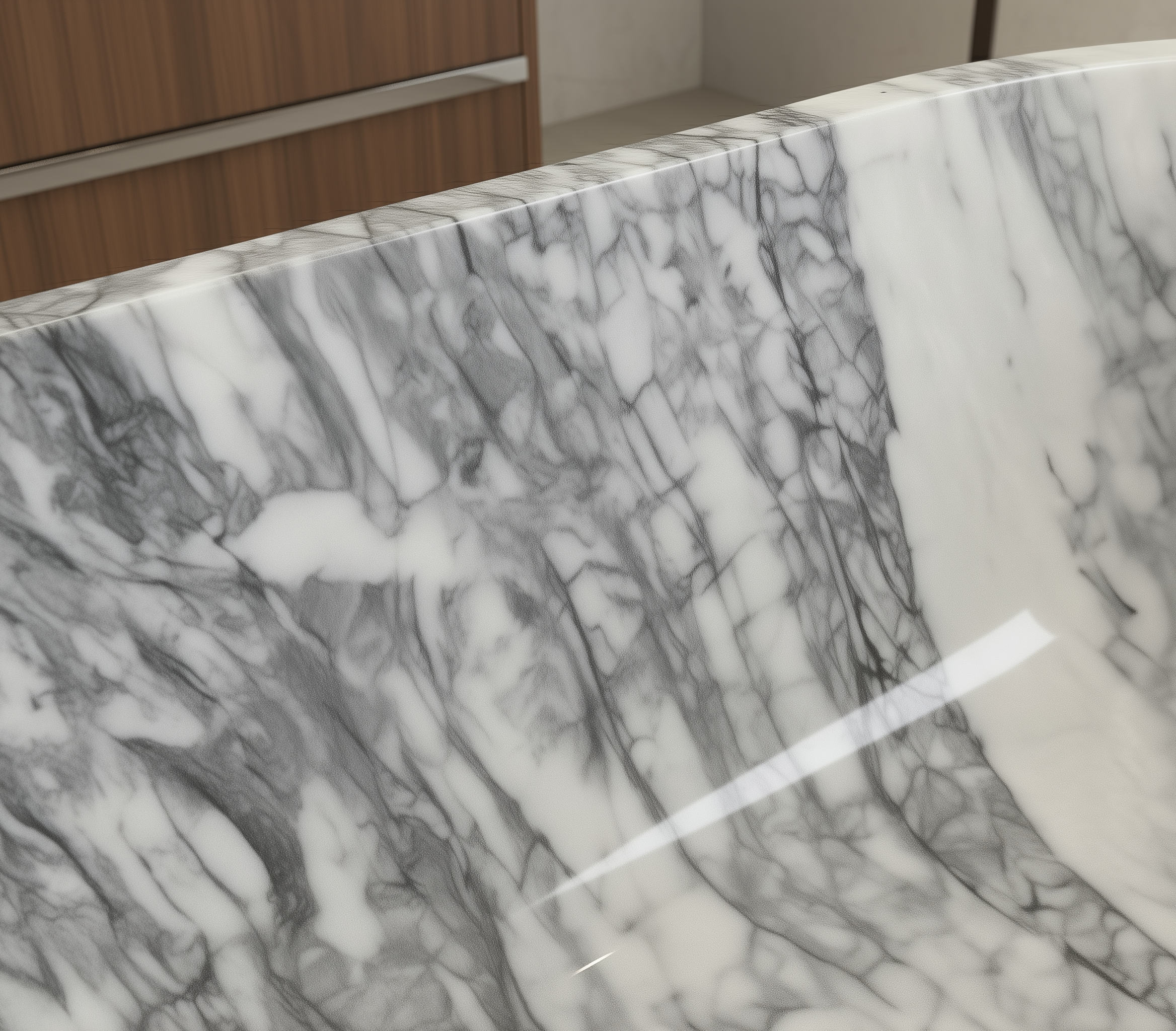 Close-up of a marble countertop with a kitchen setting in the background