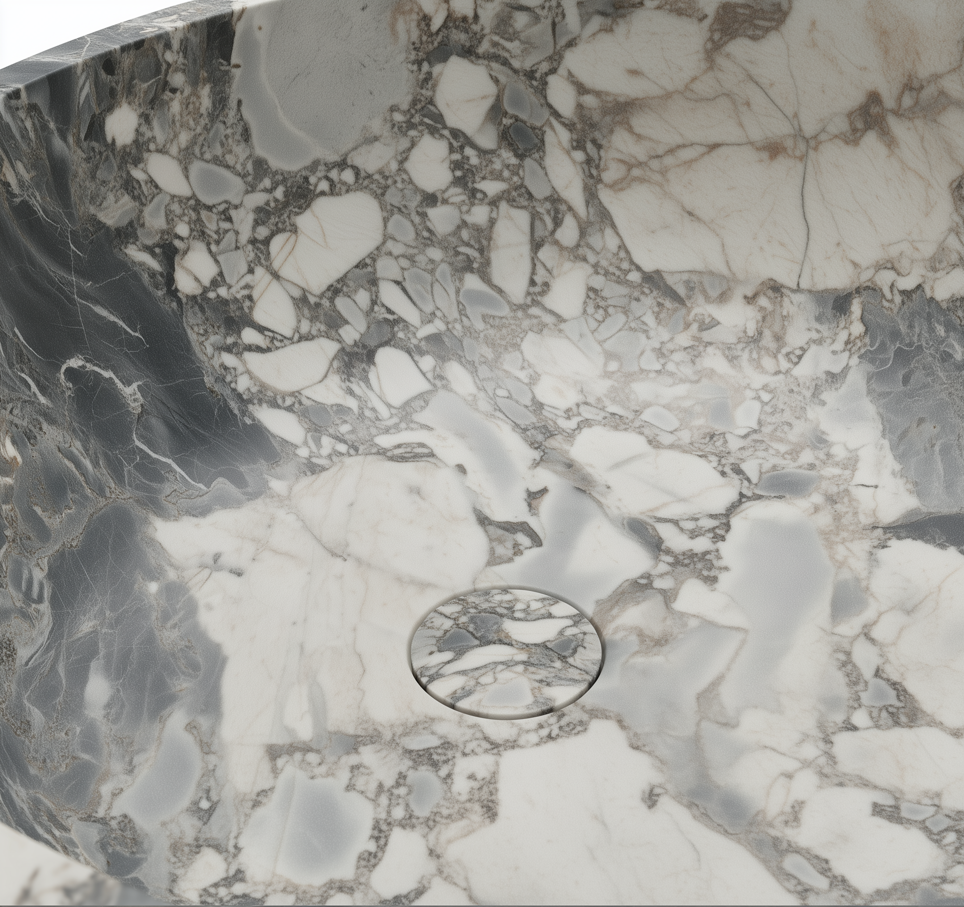 Close-up of a marble-like stone surface with gray, white, and brown patterns.