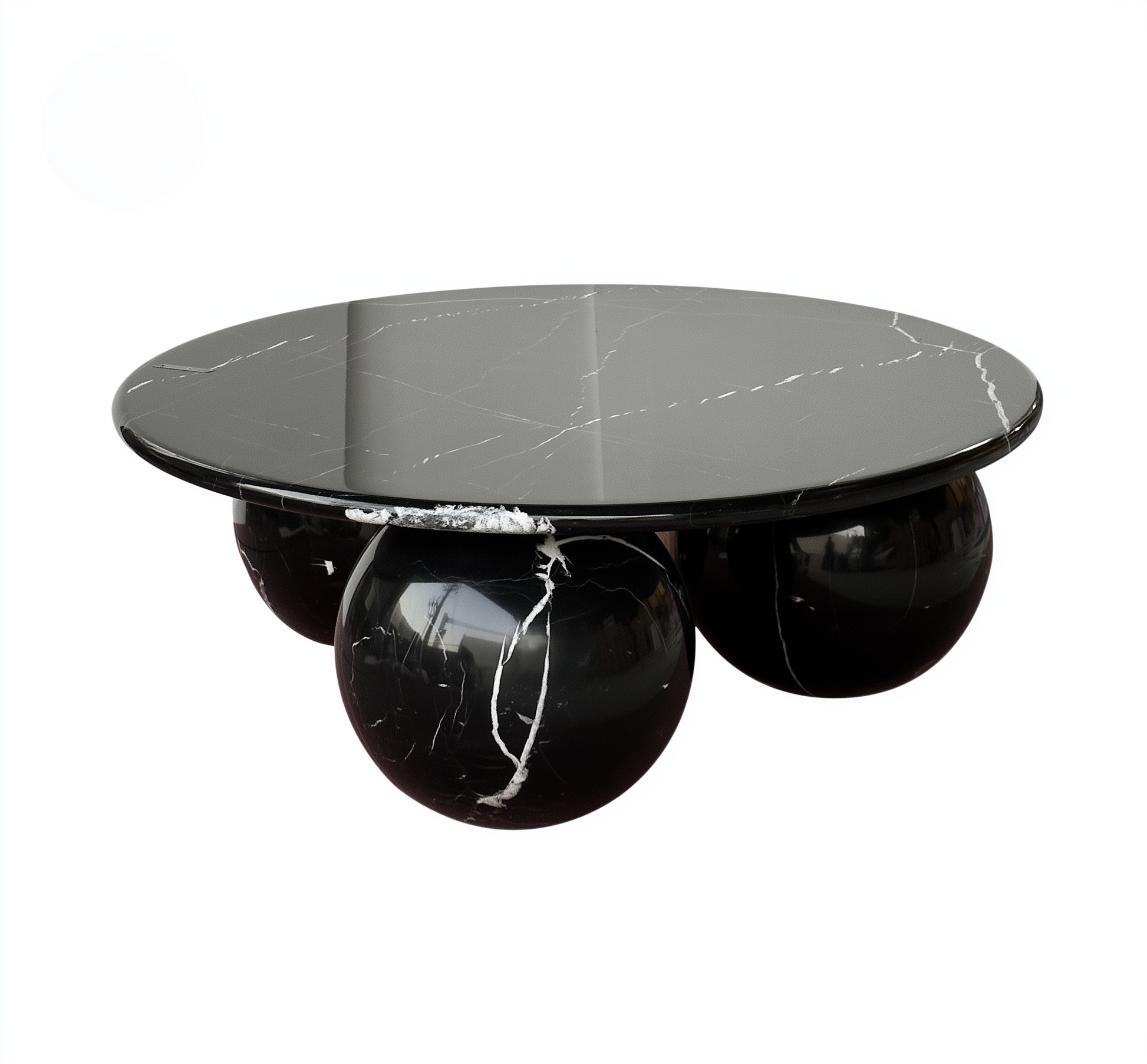 Black marble coffee table with spherical bases on a white background