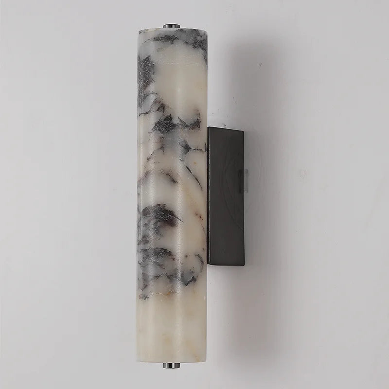 Marble-patterned cylindrical light fixture on a white background