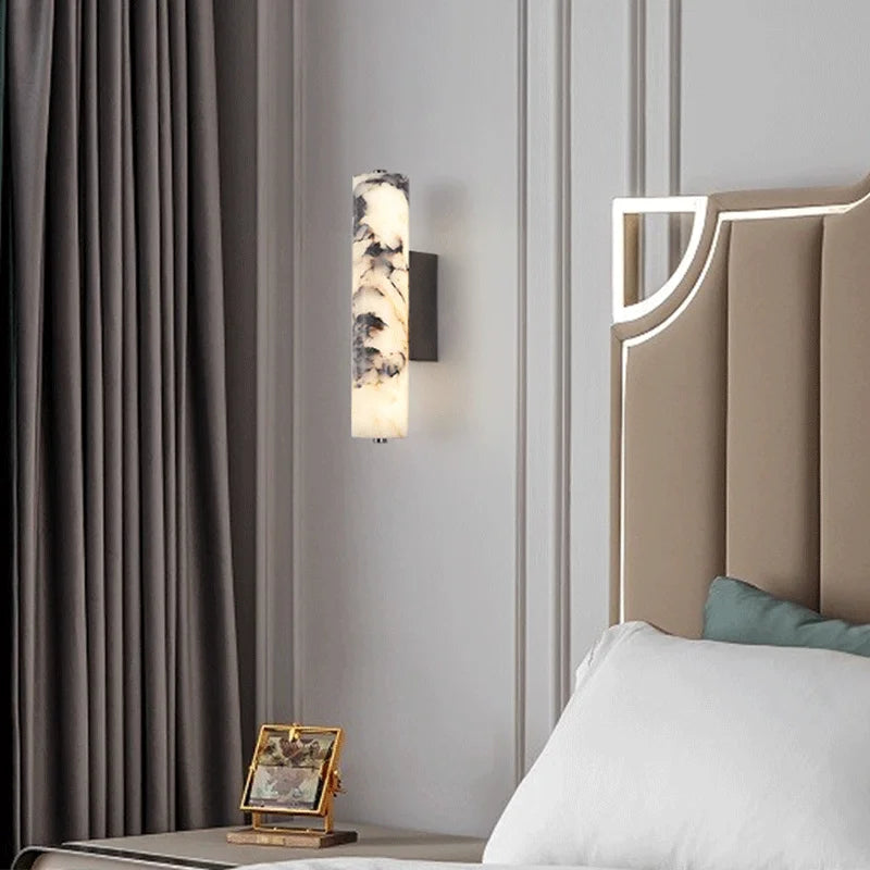 Siena marble column wall light vertical natural stone wall sconce with warm ambient glow