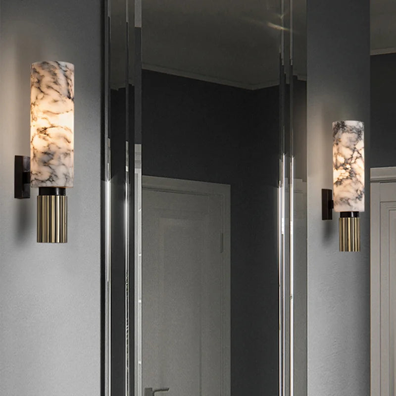 calacatta marble wall light natural stone wall sconce with brass base and warm ambient glow