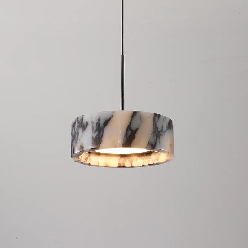 Marble-patterned pendant light on a gray background
