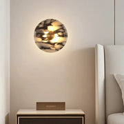 Aurora halo marble wall light round natural stone wall sconce with brass center and warm glow