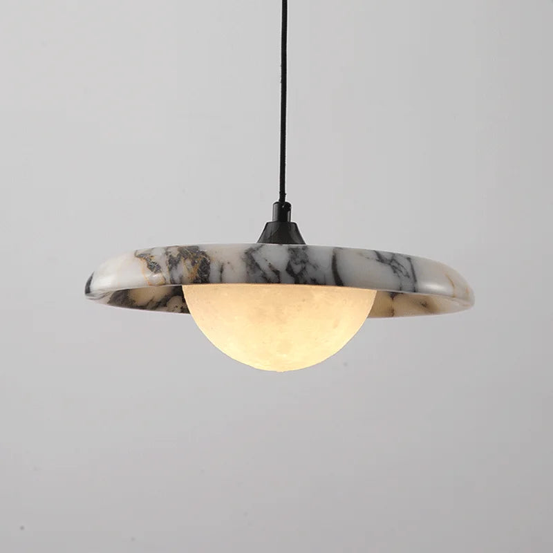 Marble-patterned pendant light on a gray background
