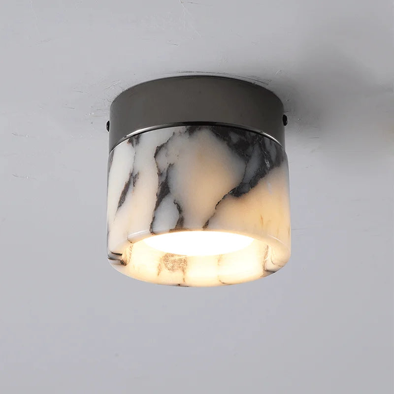 Ceiling light fixture with marble pattern on a gray background