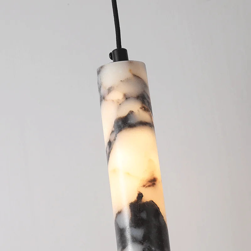 Marble-patterned pendant light on a gray background