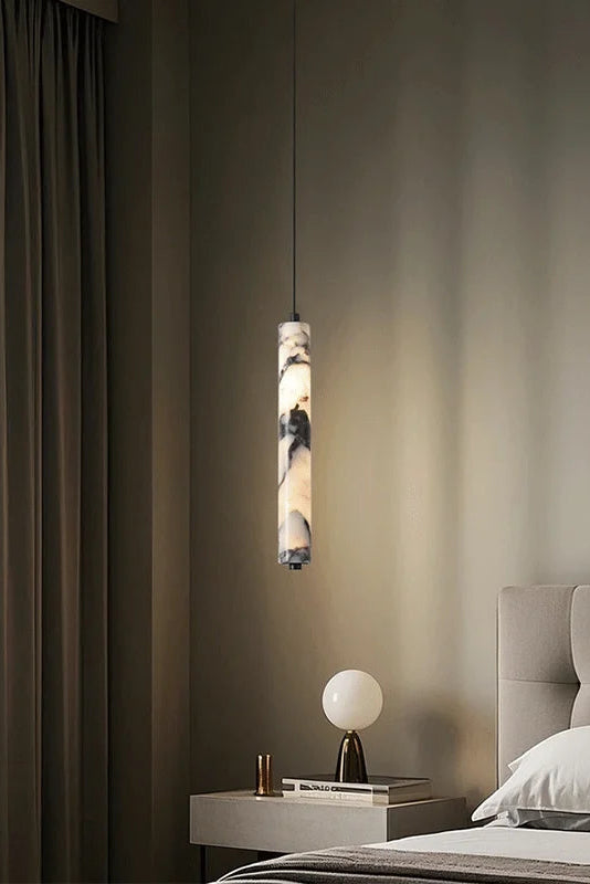 Siena marble slim pendant light natural stone cylinder hanging light with warm ambient glow