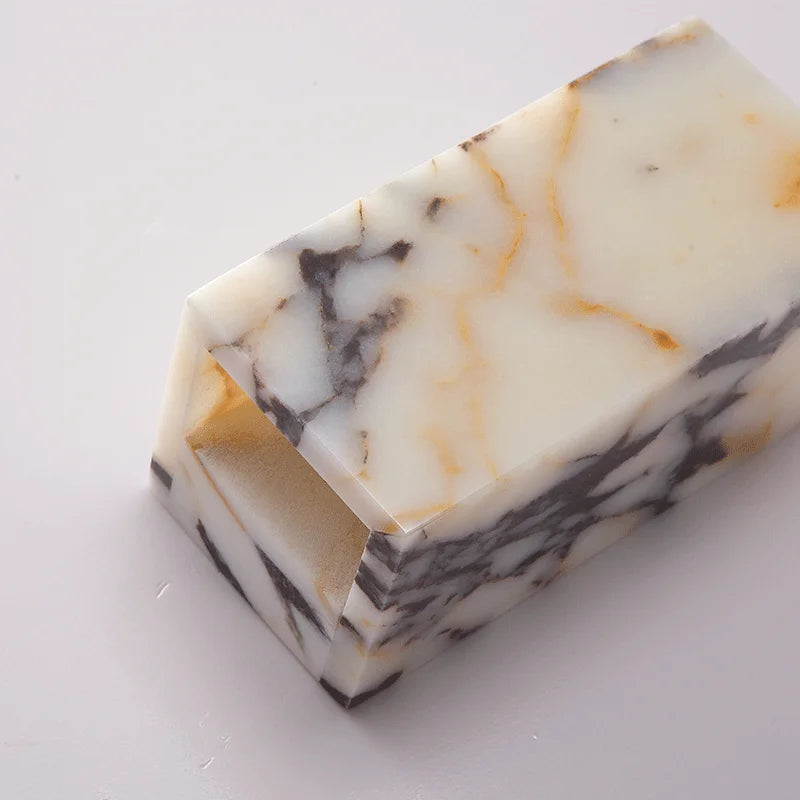 Marble-patterned light close up on a white background