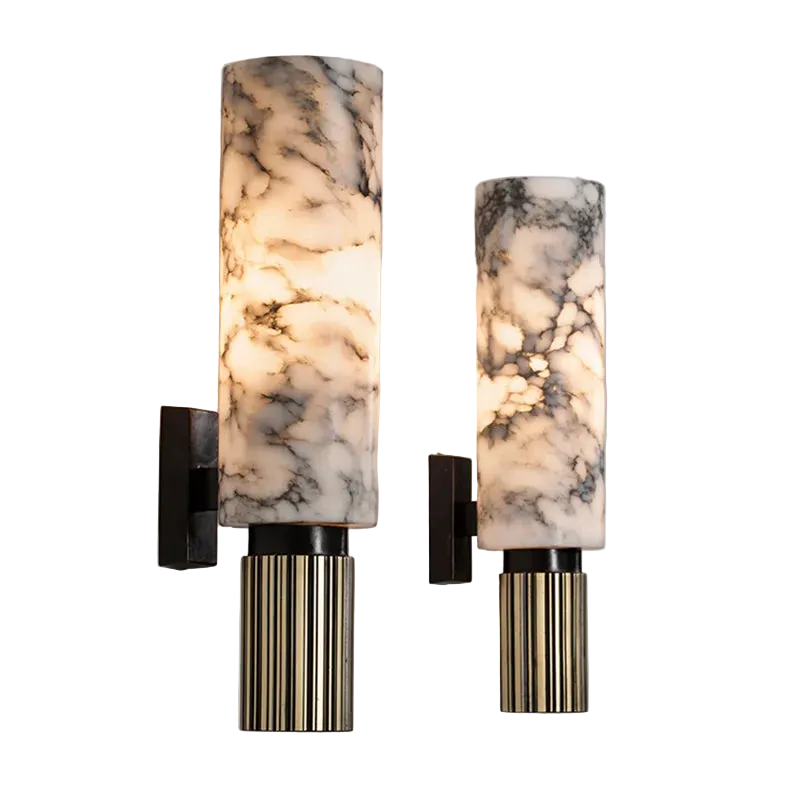 Two marble-patterned wall sconces on a light gray wall.