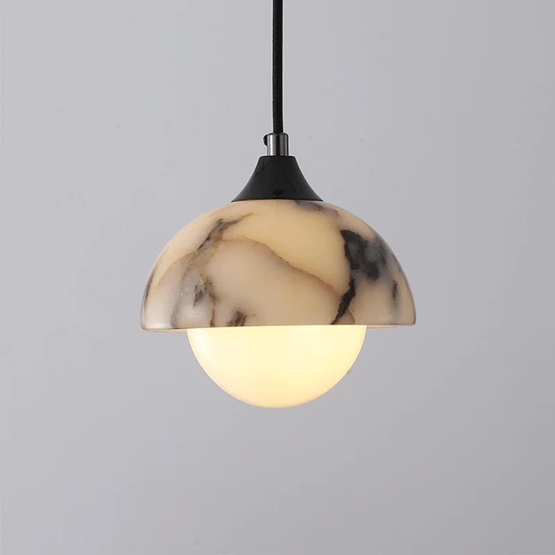 Marble-patterned pendant light on a gray background