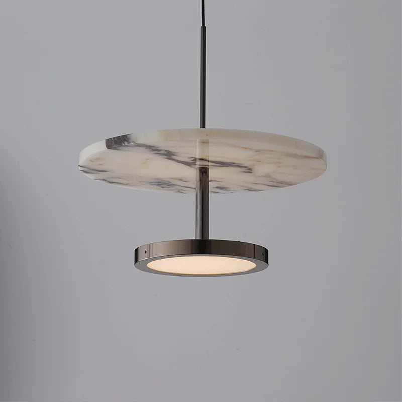Marble-patterned pendant light on a gray background