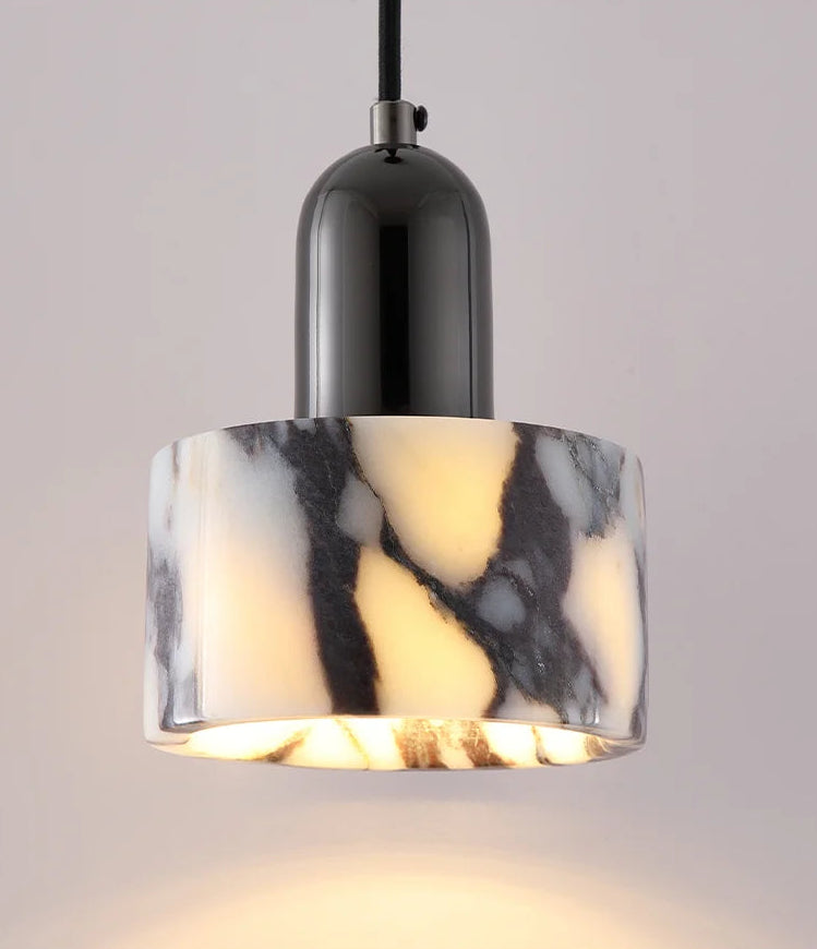Marble-patterned pendant light with black and white design on a gray background
