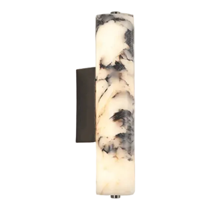 Wall-mounted light fixture with marble-like design on a neutral wall.