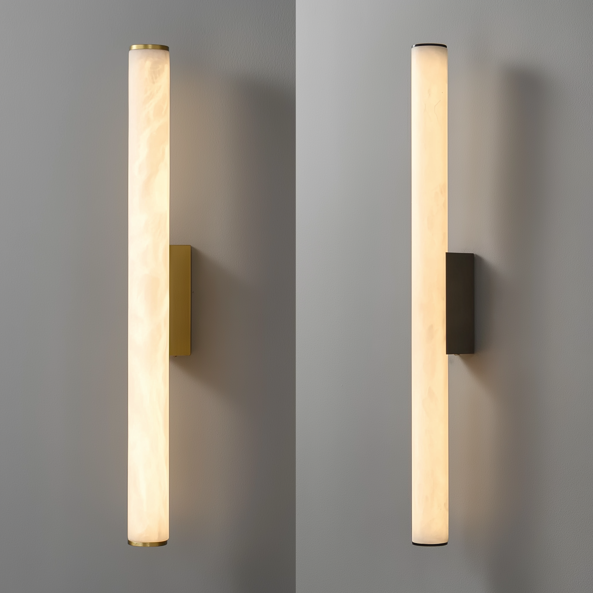 Two wall-mounted lights, one gold and one black, on a gray background.