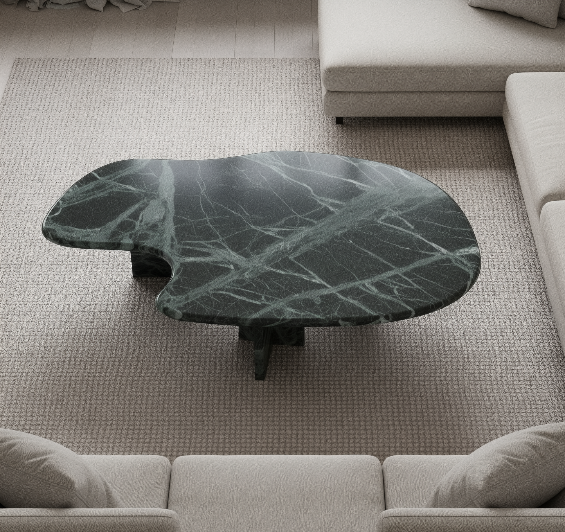 Sculptural green marble coffee table with organic freeform design