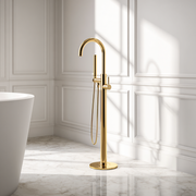 Polished gold freestanding bath tap – elegant luxury bathroom fixture in brass