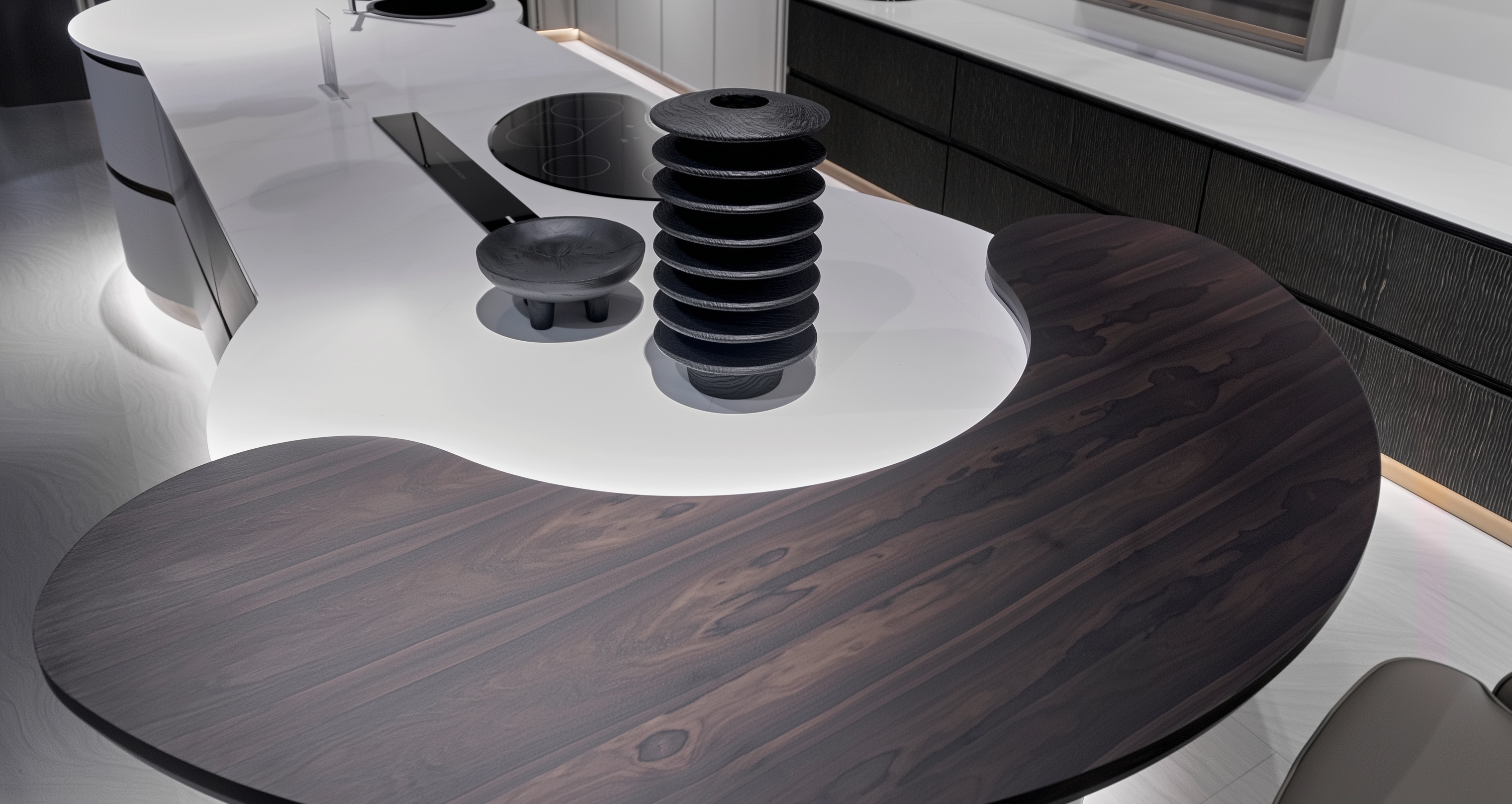 Modern kitchen counter with dark wood and white surfaces